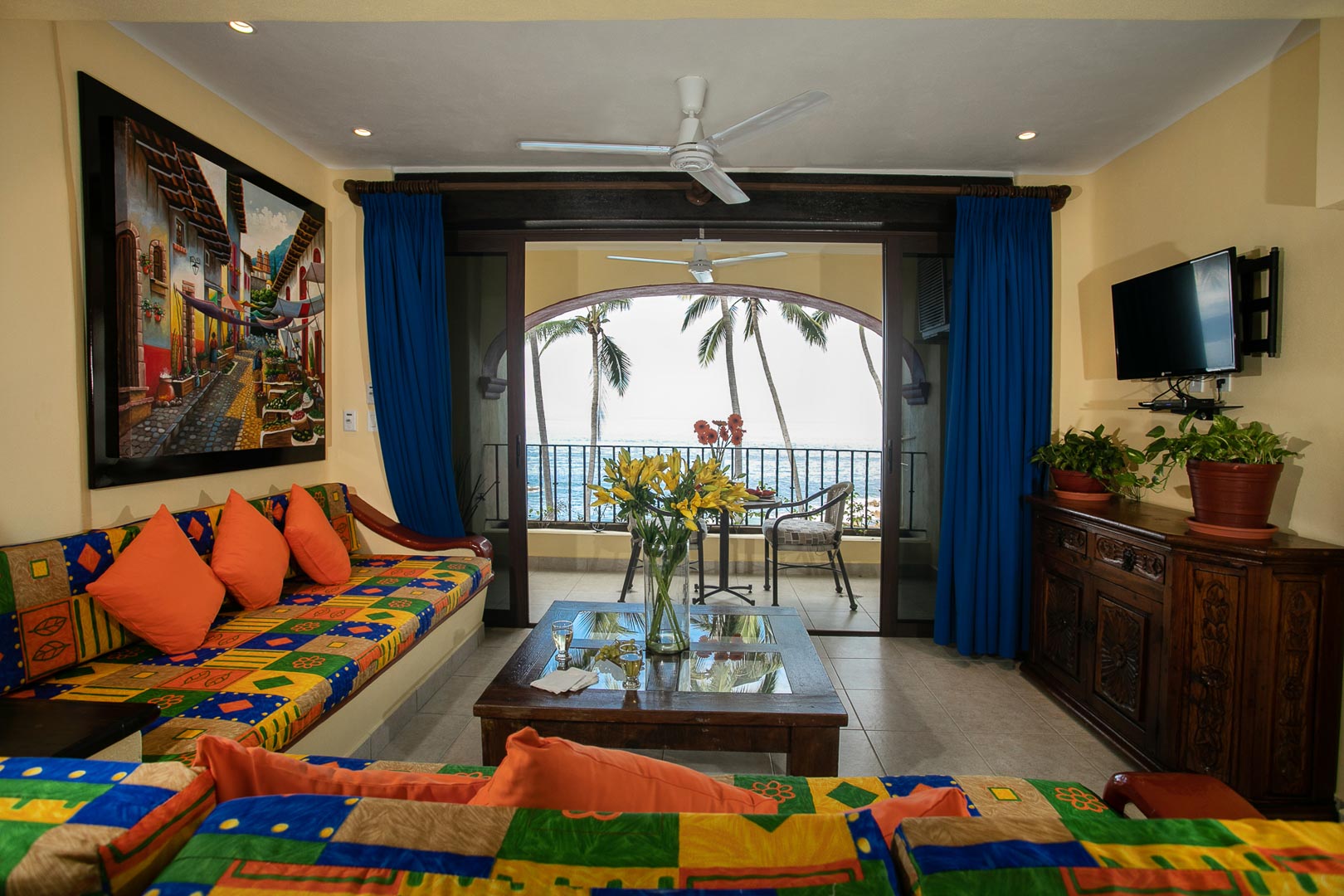 A colorful living room overlooking the beach at TPI's Lindo Mar Resort in Puerto Vallarta, Mexico.